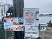 signs at float system showing fees and rules 